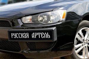 Накладка под номерной знак боковая Mitsubishi Lancer X 2007?2010