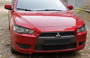 Накладки на фары Mitsubishi Lancer X
